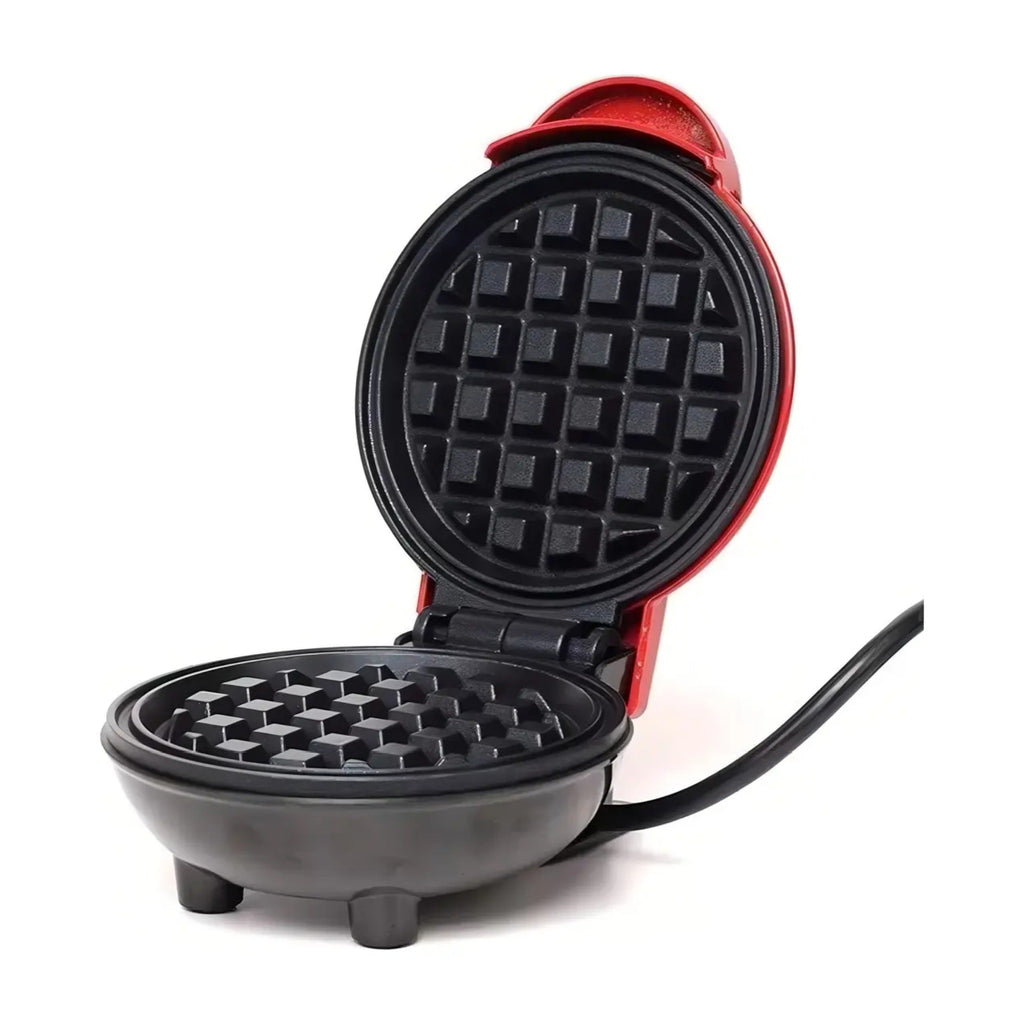 Waflera mini antiadherente roja abierta mostrando las placas de waffle